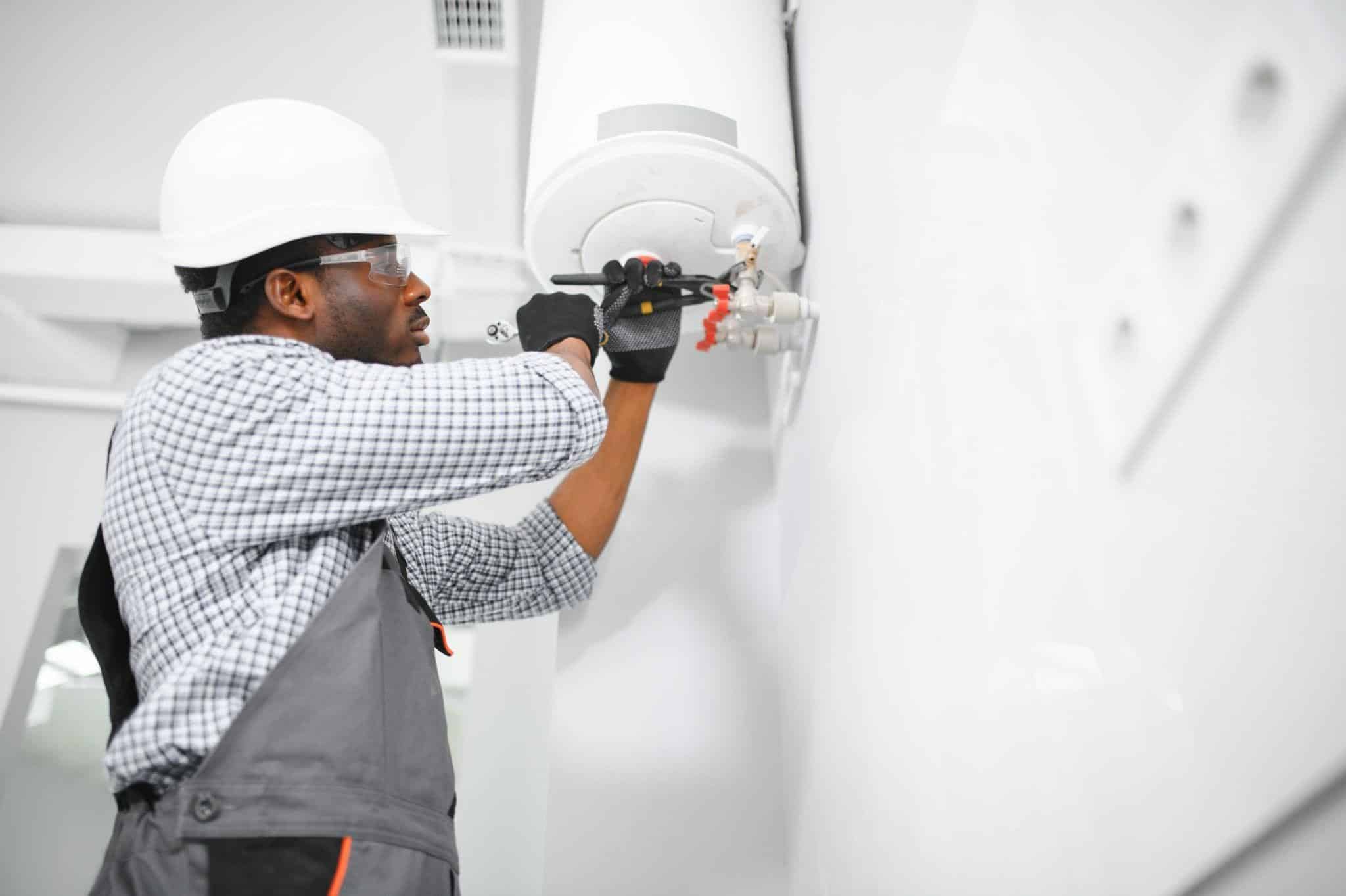 Licensed plumber handling Dallas water heater repair and maintenance service.