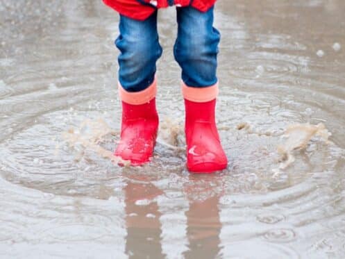 Standing water under house piers in a Cooper TX crawl space before diagnosis.