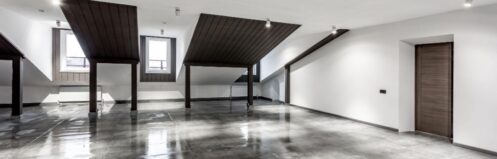 Water coming up through slab flooring in a Mesquite postwar ranch home before testing.