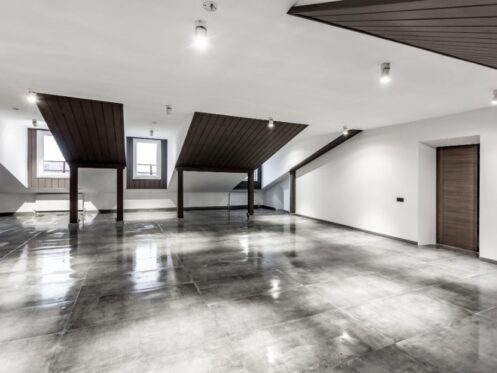 Water coming up through slab flooring in a Mesquite postwar ranch home before testing.